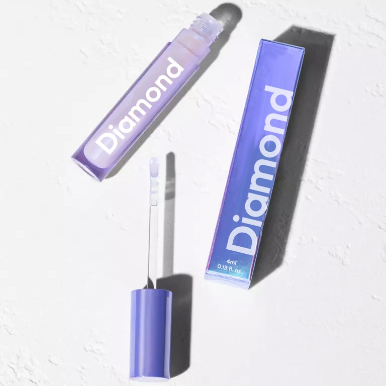 Diamond Smile valkaiseva hehkutikku pakkauksineen